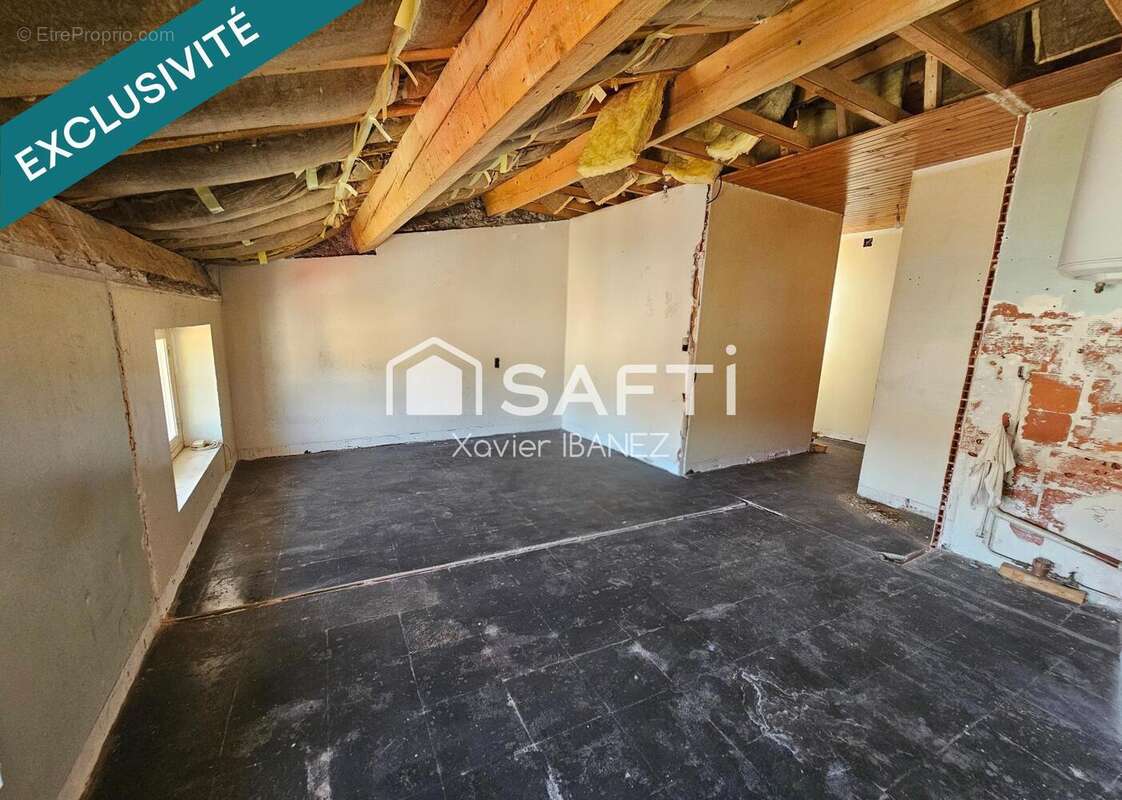 Photo 2 - Appartement à LE MALZIEU-VILLE