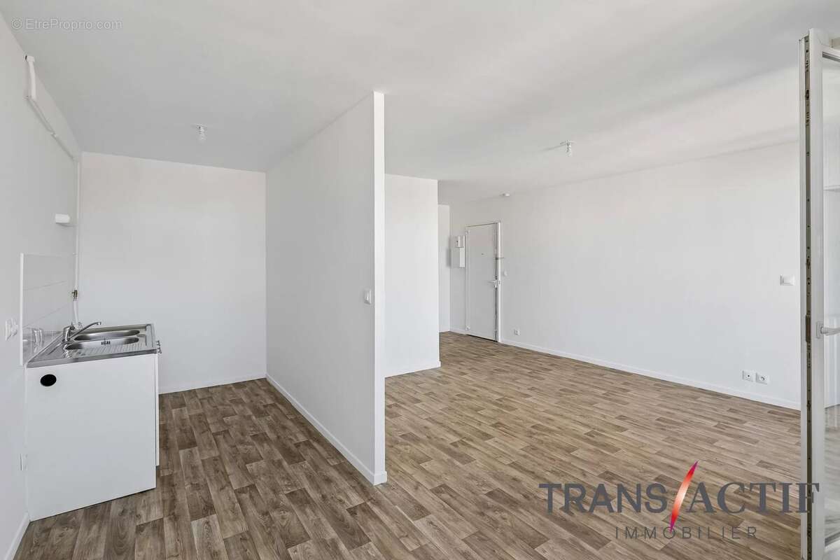 À vendre – Superbe 4 pièces de 77 m² avec balcon, box et cave - photo 5