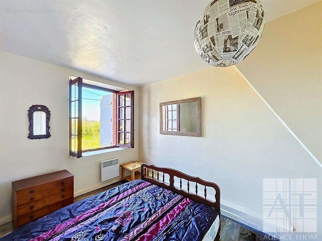 Maison à JUVIGNE