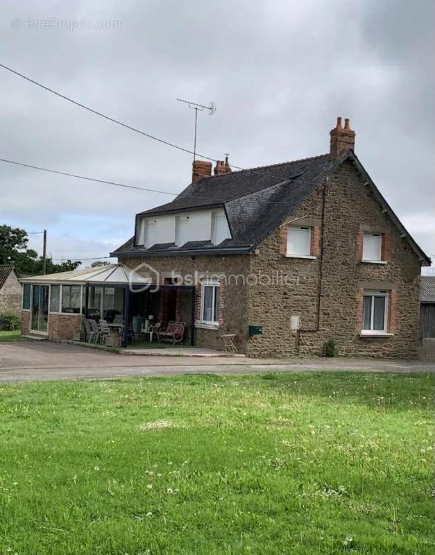 Maison à JUVIGNE