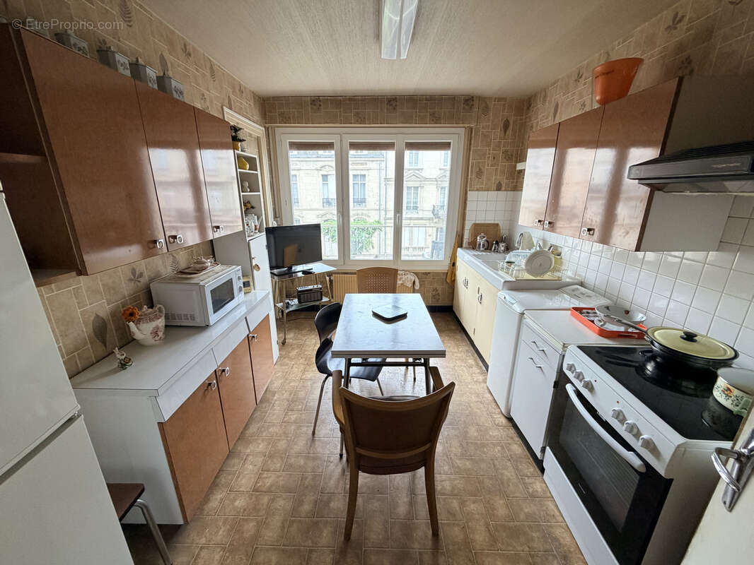 Appartement T4 à rénover avec garage à Reims - photo 5
