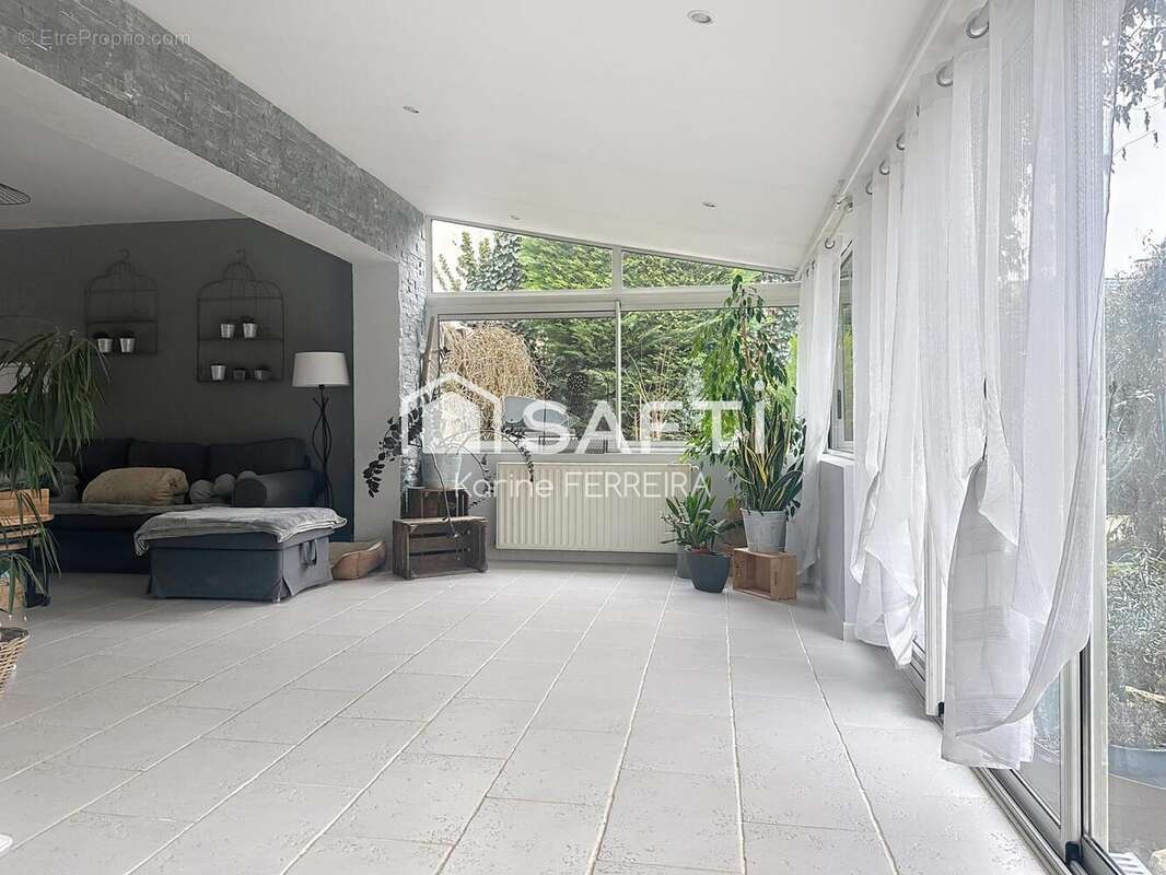 Photo 2 - Maison à BRIE-COMTE-ROBERT