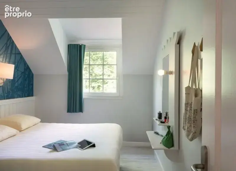 INVESTISSEMENT LOCATIF  CHAMOUILLE  Résidence de tourisme Center Parcs Le Lac d'Ailette - 7.55% de rentabilité - photo 4