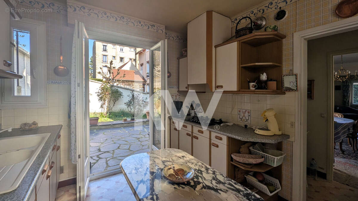 Maison 122 m² à Enghien-Les-Bains  - photo 6