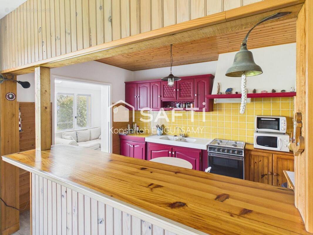 Photo 1 - Maison à PLOUIGNEAU