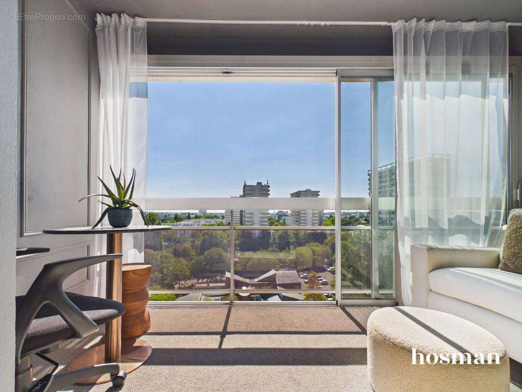 Appartement T2 de 46,47 m² avec loggia vue Loire, parking et cave - secteur Ile de Nantes - photo 2