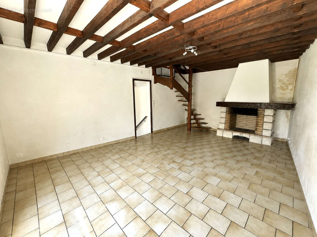 Maison avec beaux volumes - 3 chambres - garage et jardin - photo 11