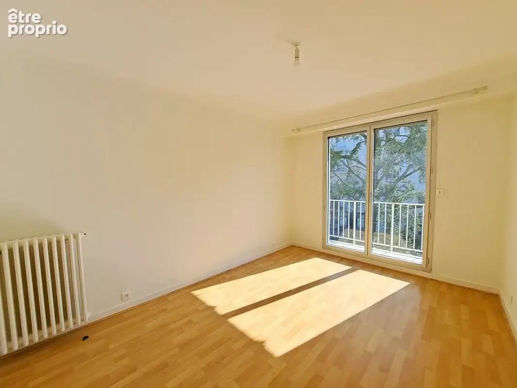 Spacieux appartement T4 de 100,97 m² avec balcon, cave et parking - photo 9