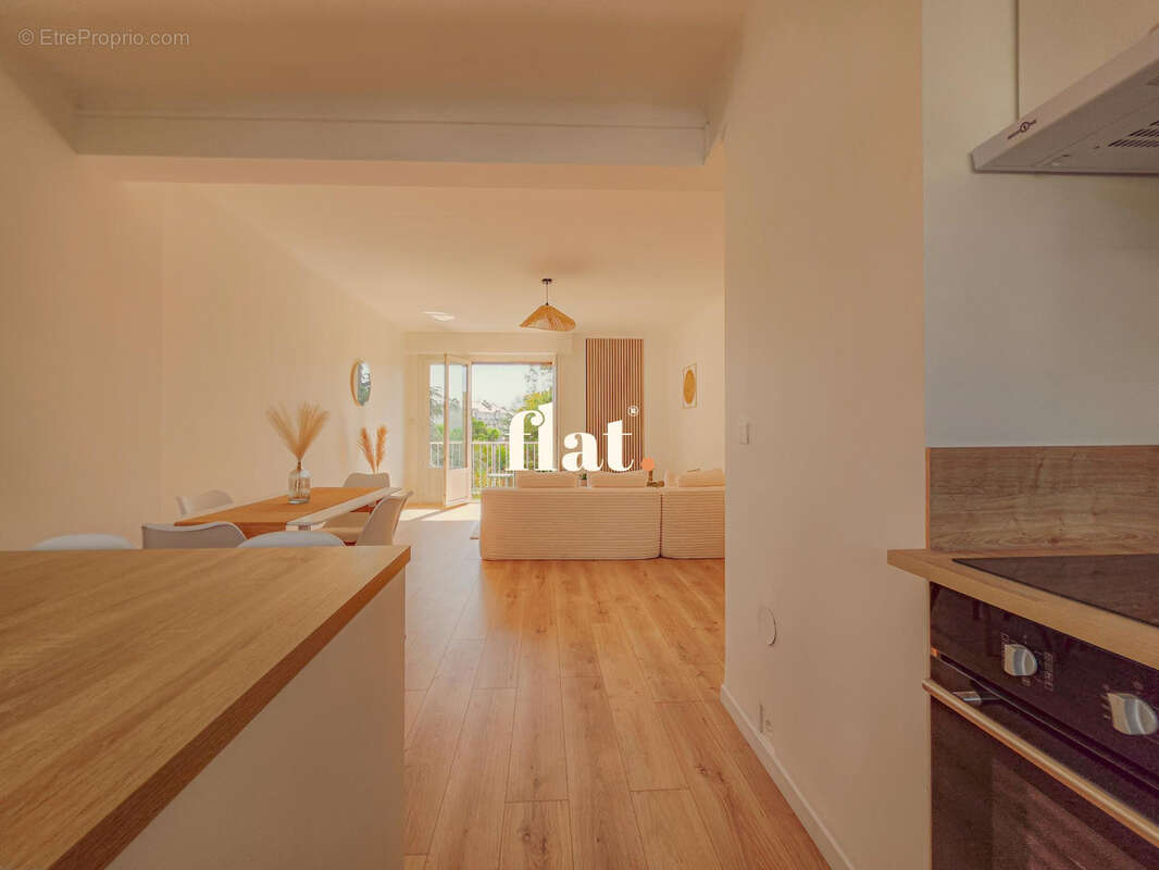 Appartement T3 de 70 m2  - RD POINT DE VANNES - 2 chambres + Cave - photo 6