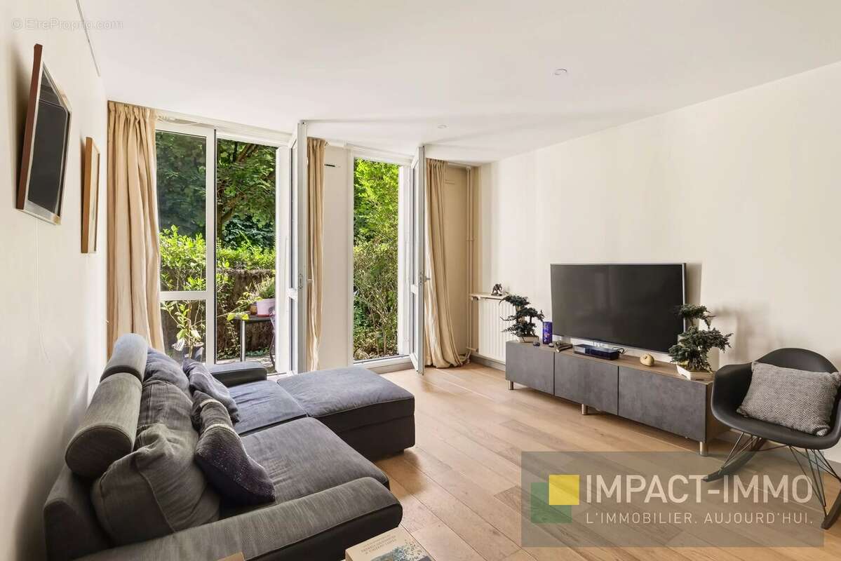Puteaux – rez de jardin 3 pièces de 68 m² + jardin + terrasse + parking - photo 2