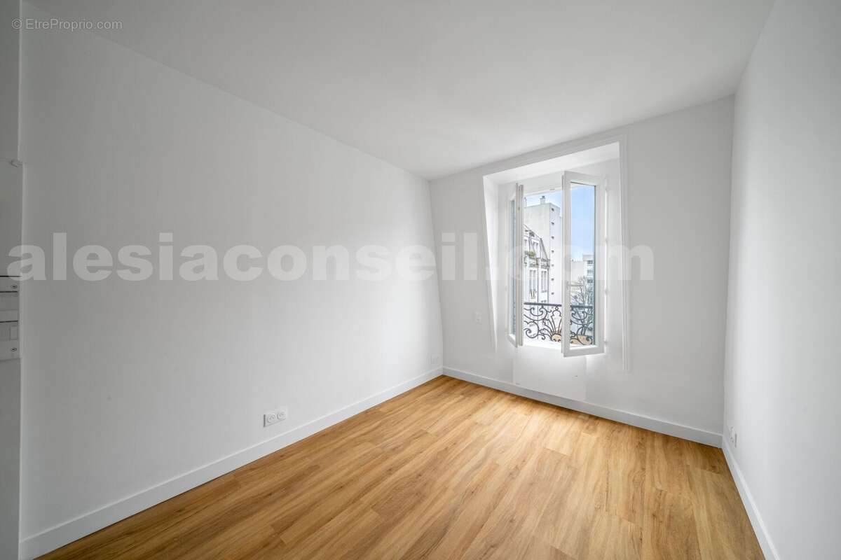 Photo n°5 - Appartement à PARIS-14E