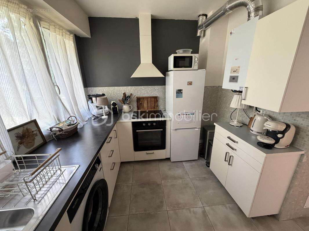 Appartement f3 avec balcon + box + cave + cellier - photo 11