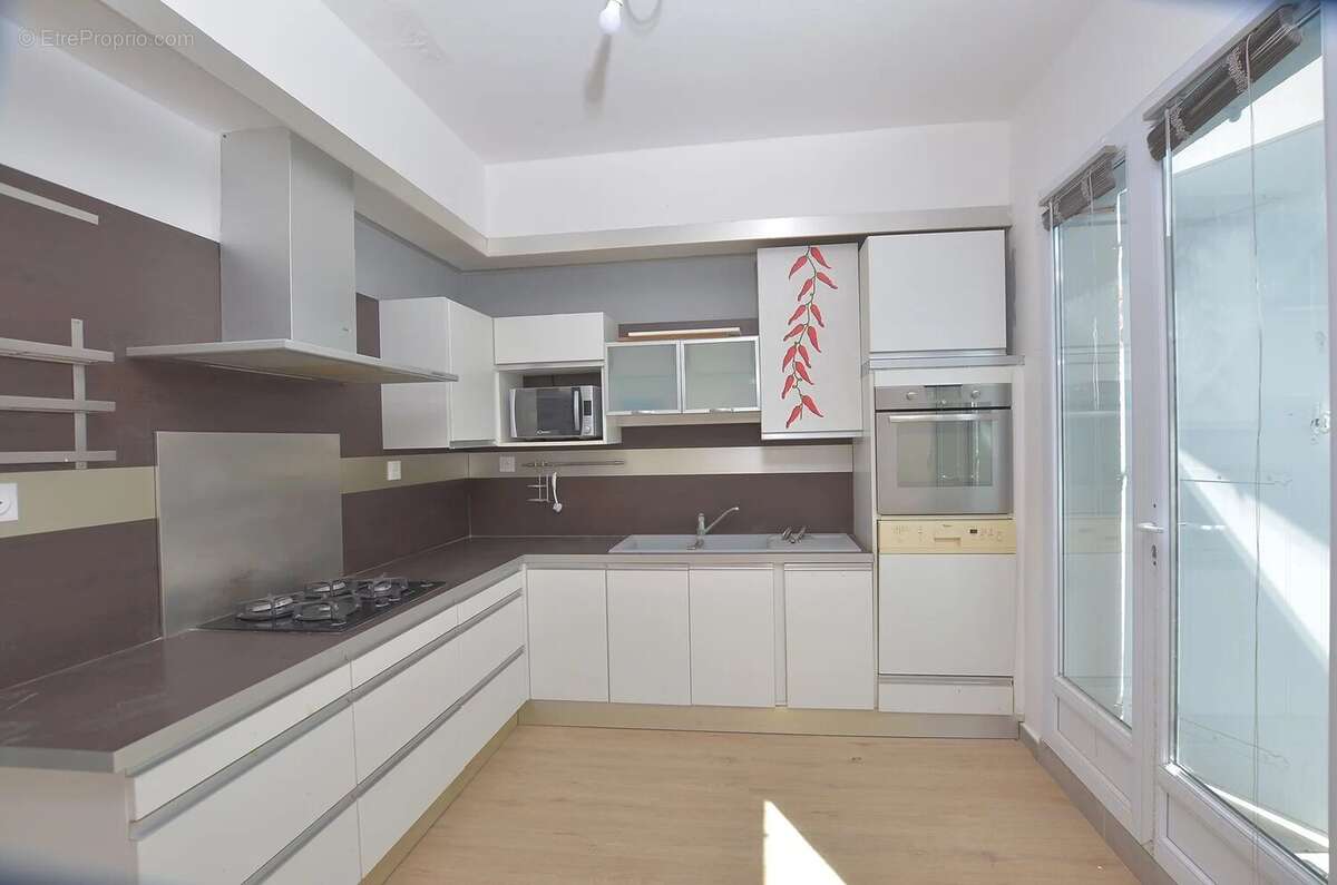 Appartement t2 rive droite 1er etage - photo 3