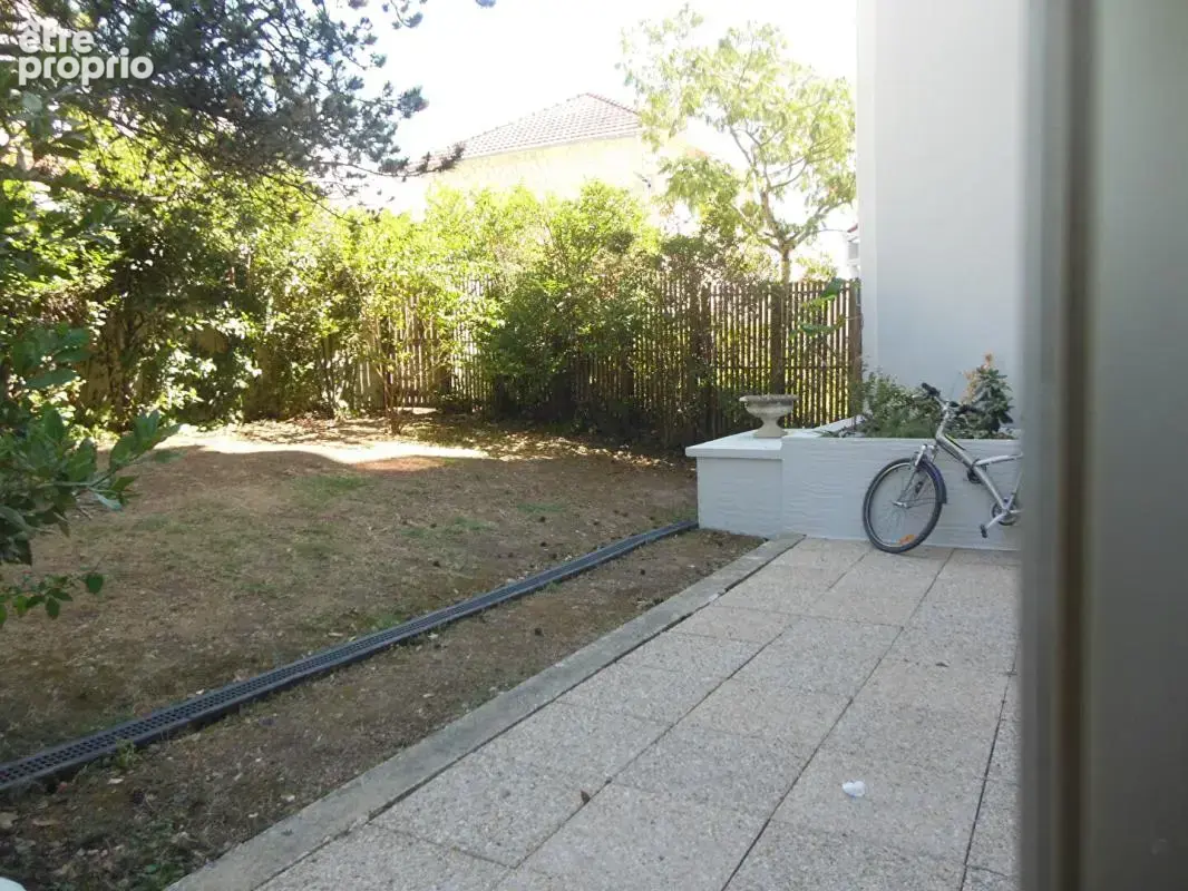 Appartement 2 pièces avec jardin terrasse et garage proche Marché - photo 4
