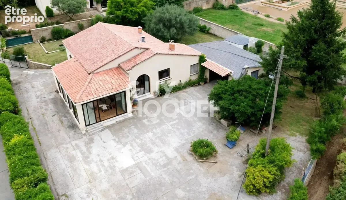 Maison à LAUDUN-L'ARDOISE