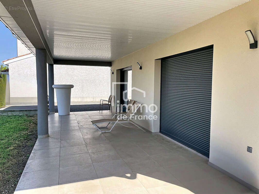 Maison plain pied Peronnas 5 pièce(s) 136 m2 - photo 12