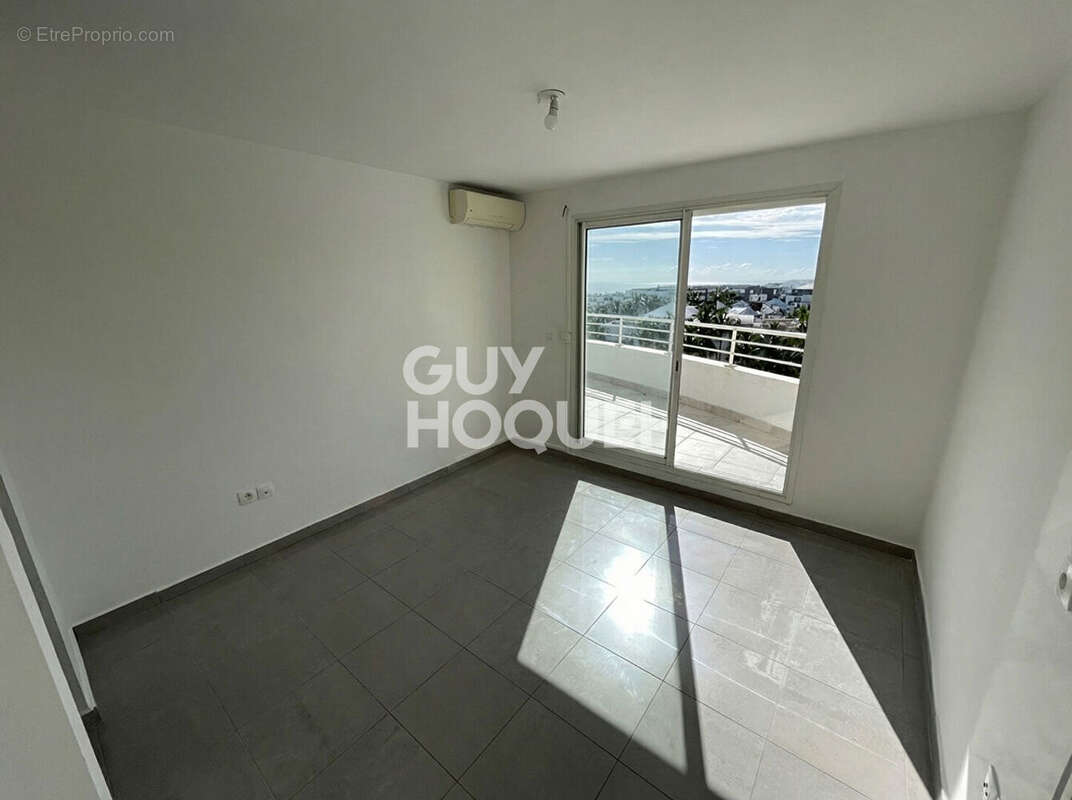 Appartement  T2 Saint Denis 44 m2 + 2 varangues vue mer - photo 3