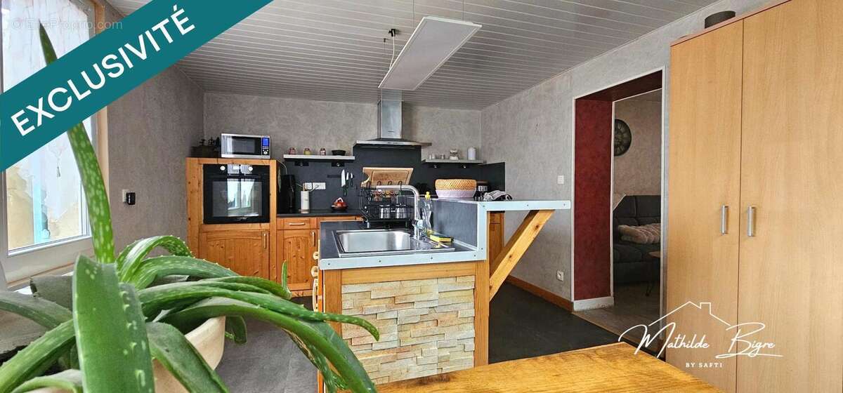 Photo 4 - Maison à LE BREUIL-SUR-COUZE