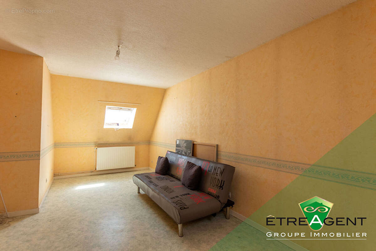 Maison DAMVILLE CENTRE-VILLE - 142 m² - 3 chambres - photo 11