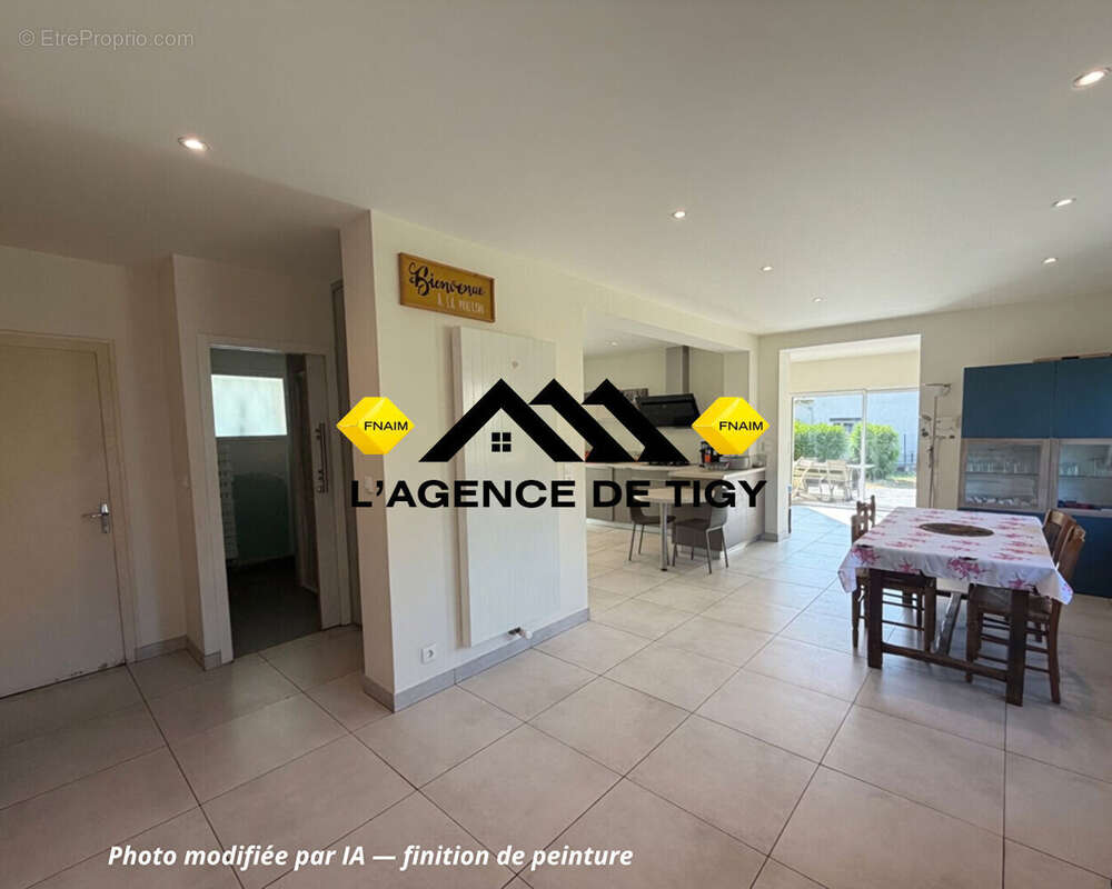 Maison plain-pied dans centre bourg - photo 2