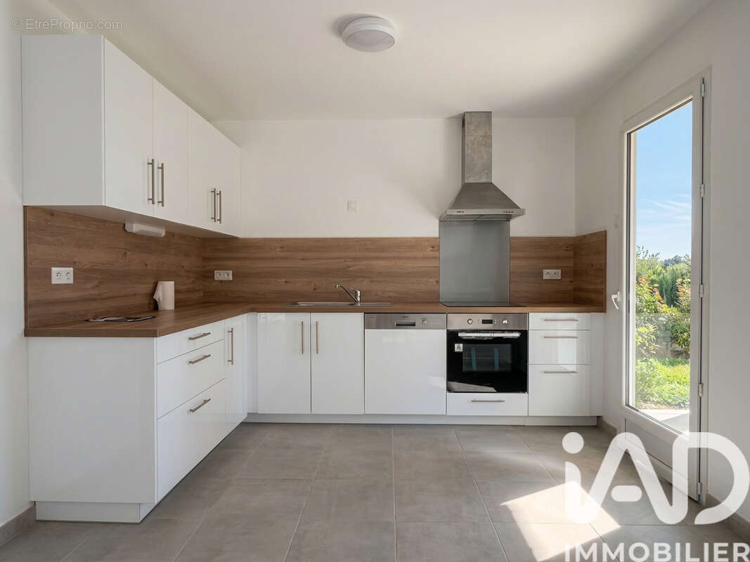 Maison 93 m² à Breteil  - photo 2
