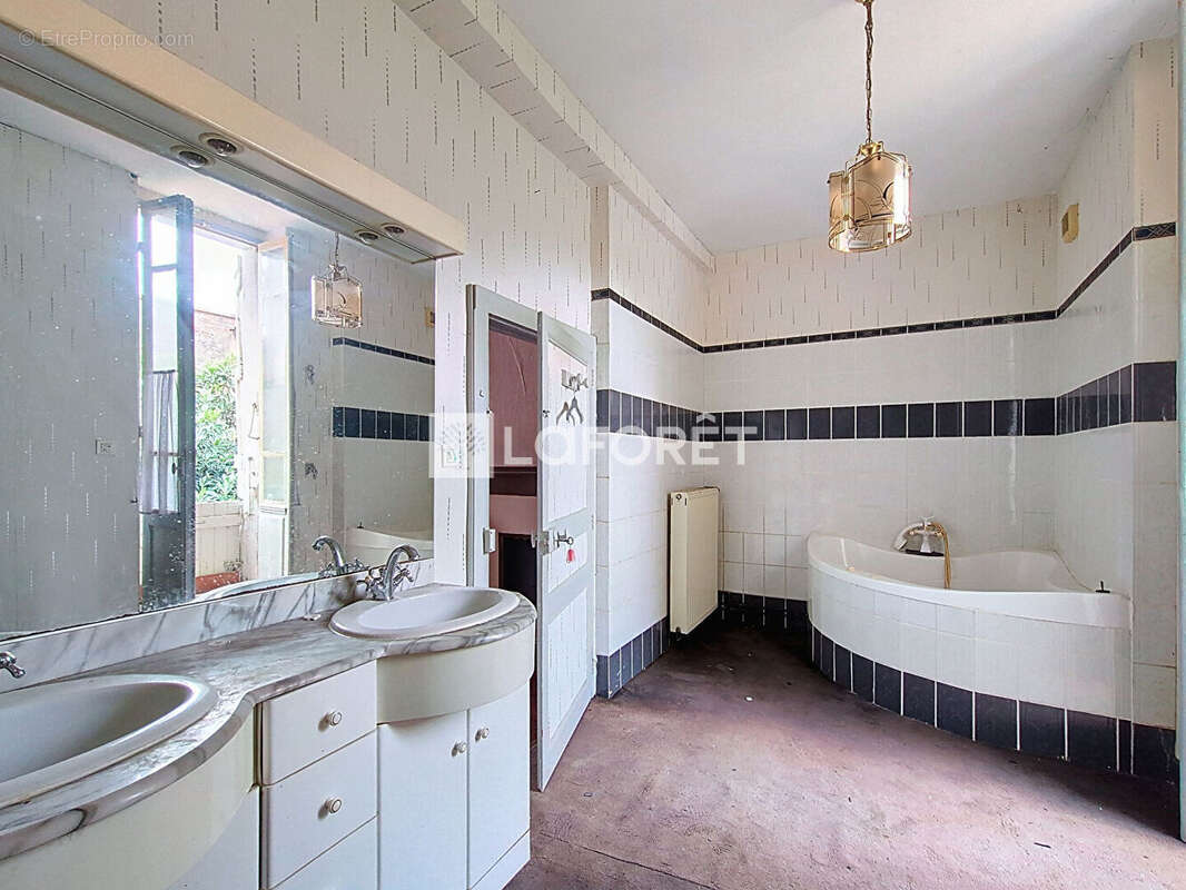 Maison Bessieres 9 pièce(s) 215 m2 - photo 11