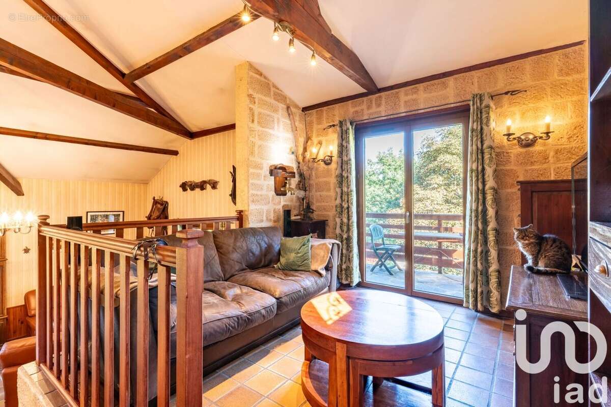 Photo 2 - Maison à SAINT-GENEST-LERPT