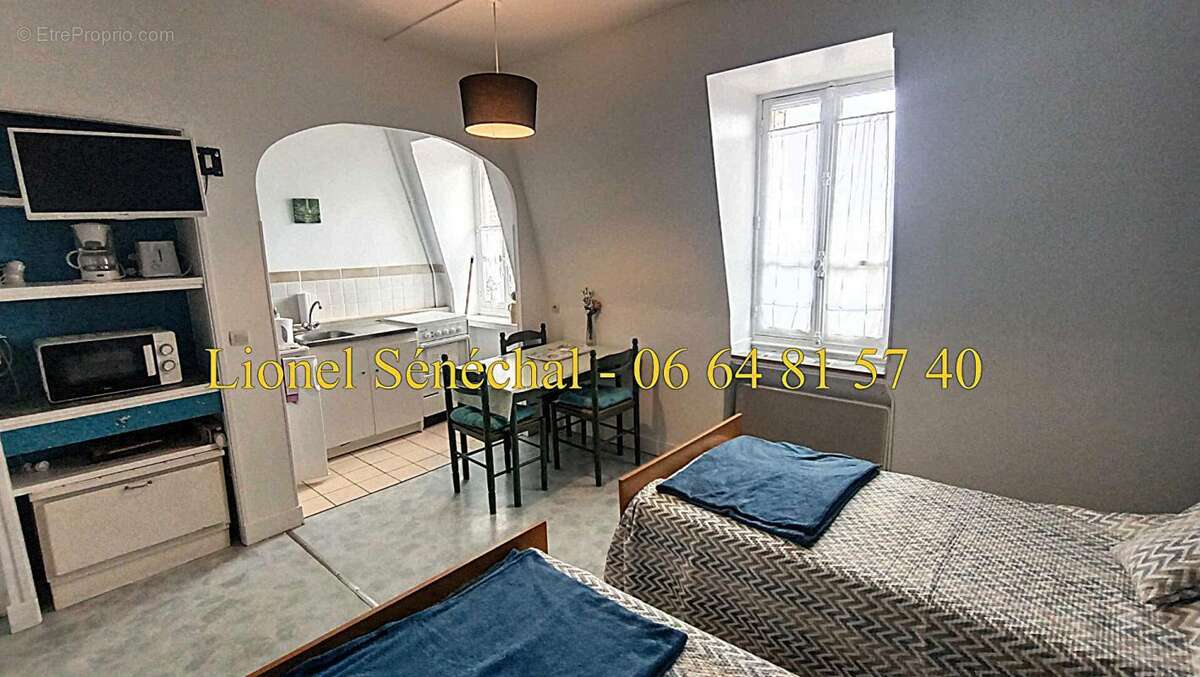 Opportunité rare : immeuble de caractère avec 12 studios dans une demeure de prestige en plein centre-ville de Bagnoles-de-l'Orn - photo 4