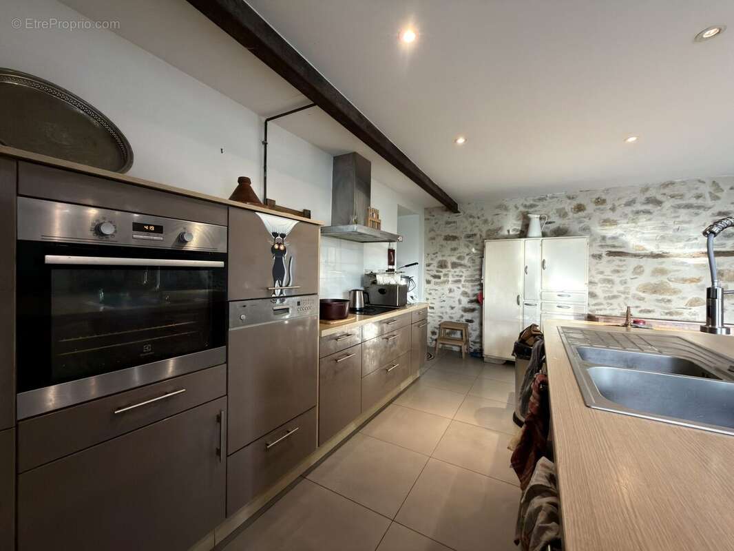 Maison à SAINT-AUBIN-D'AUBIGNE