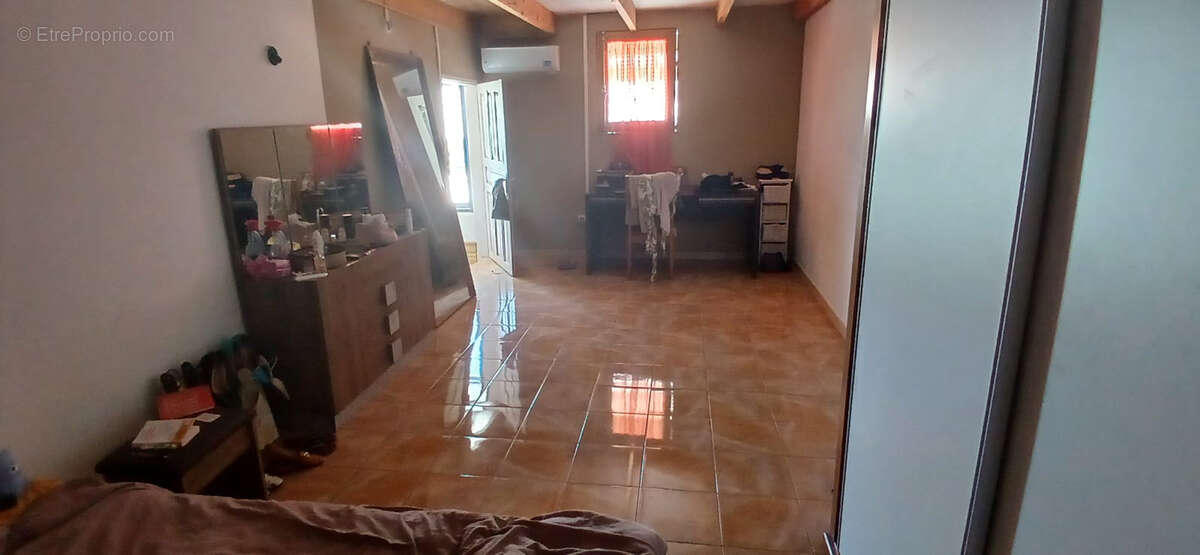 "Superbe villa spacieuse et lumineuse de 350 m² dans un quartier résidentiel de Ravine Creuse Saint André - photo 13