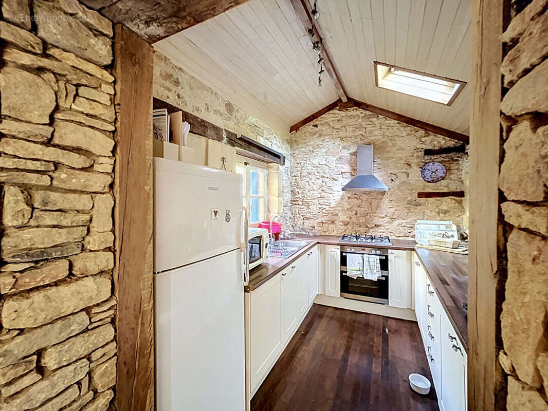 Maison en pierre avec jardin proche Prayssac - photo 5