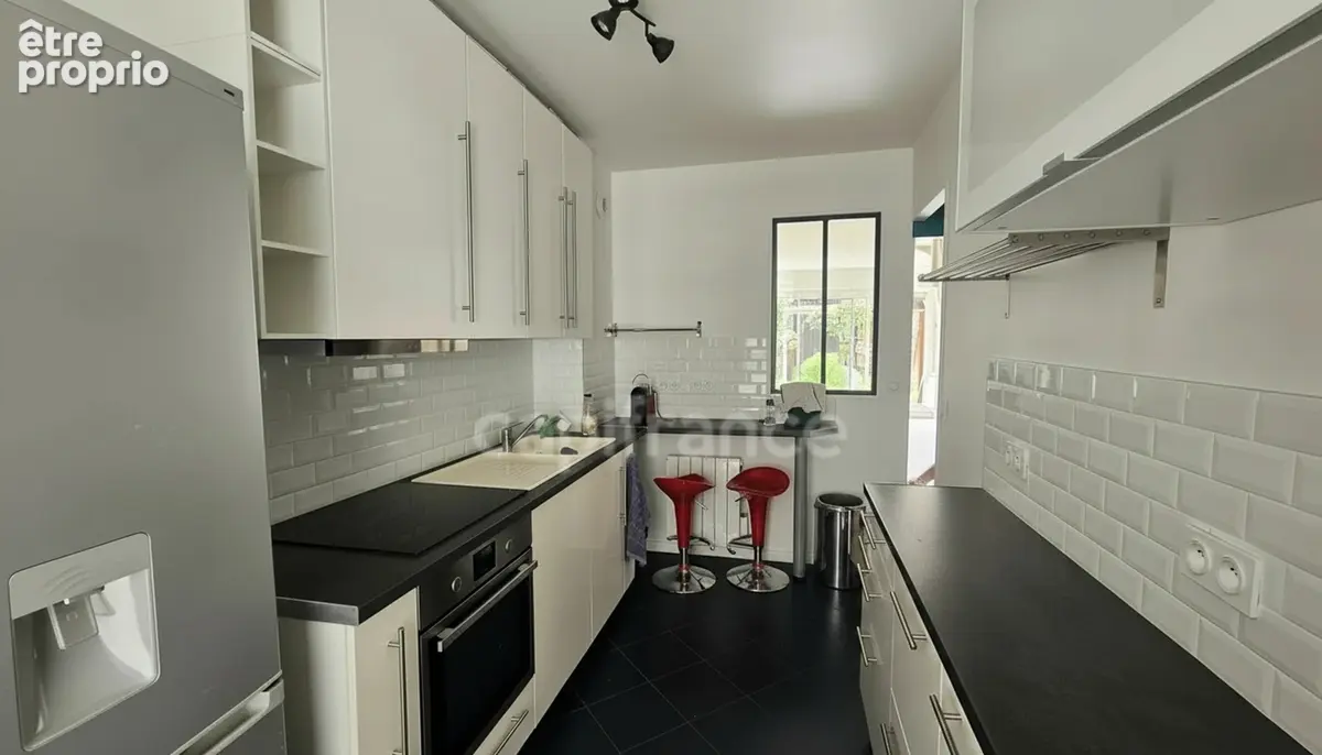 Maison 85 m² – Quartier Grande Ile – Jardin, terrasse, garage et belle luminosité - photo 3
