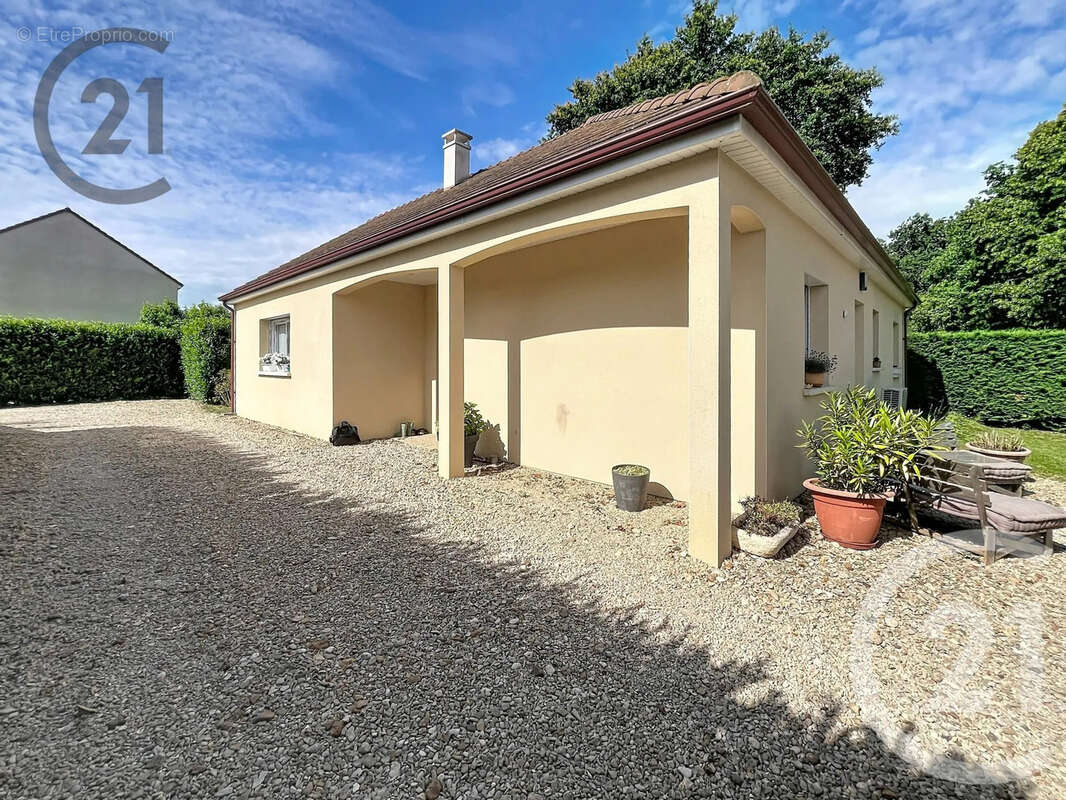 Maison 111 m² à Beaumont  - photo 2