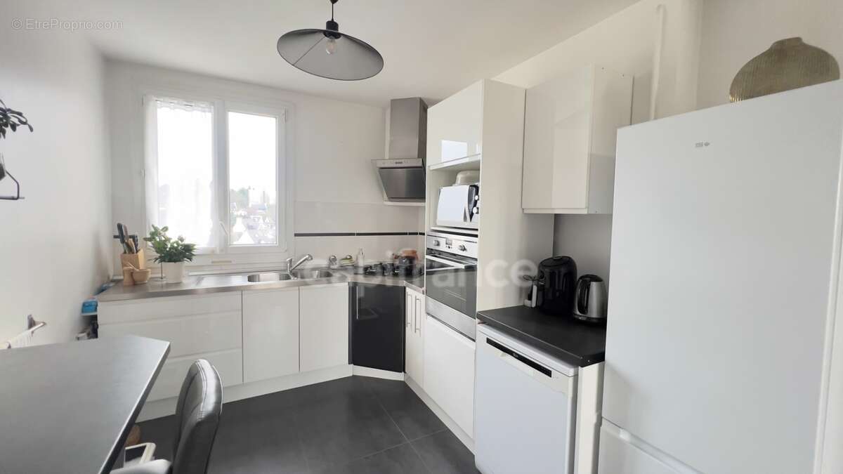 QUIMPER-Sud, rue du Léon (Quartier Prat-Maria), appartement de type T5 modifié en T4 de plus de 83 m² habitable, situé au 7ème é - photo 7