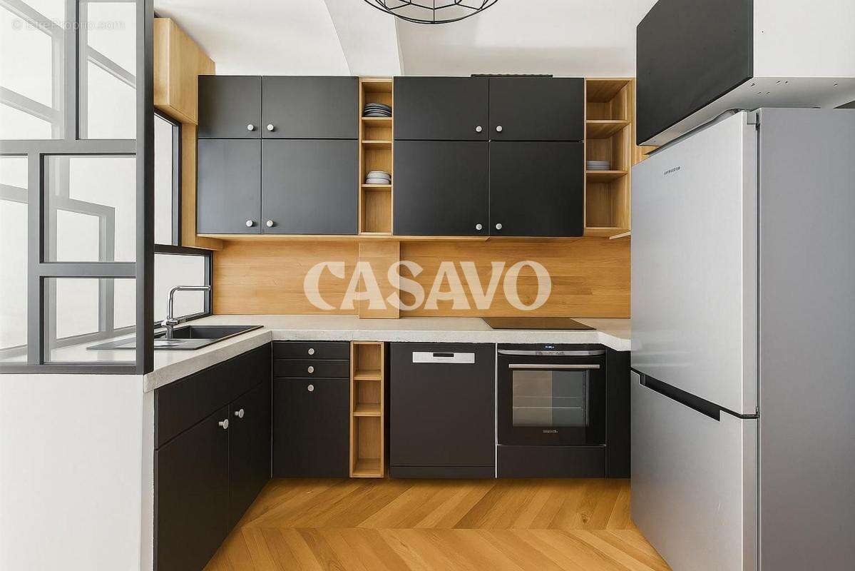 Vente Appartement 5 pièces de 100m² - 75018 Paris - photo 2