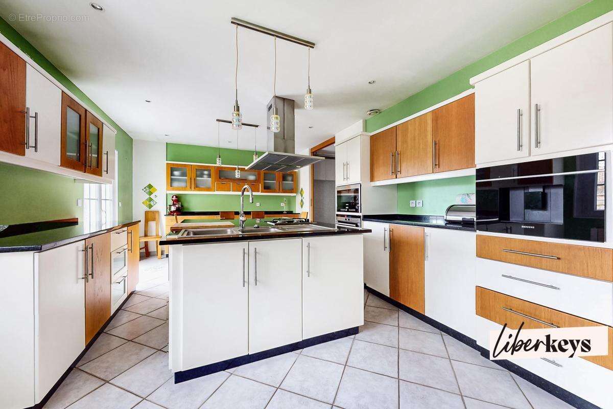 Maison familiale 6 pièces 180 m² - Secteur prisé - photo 18