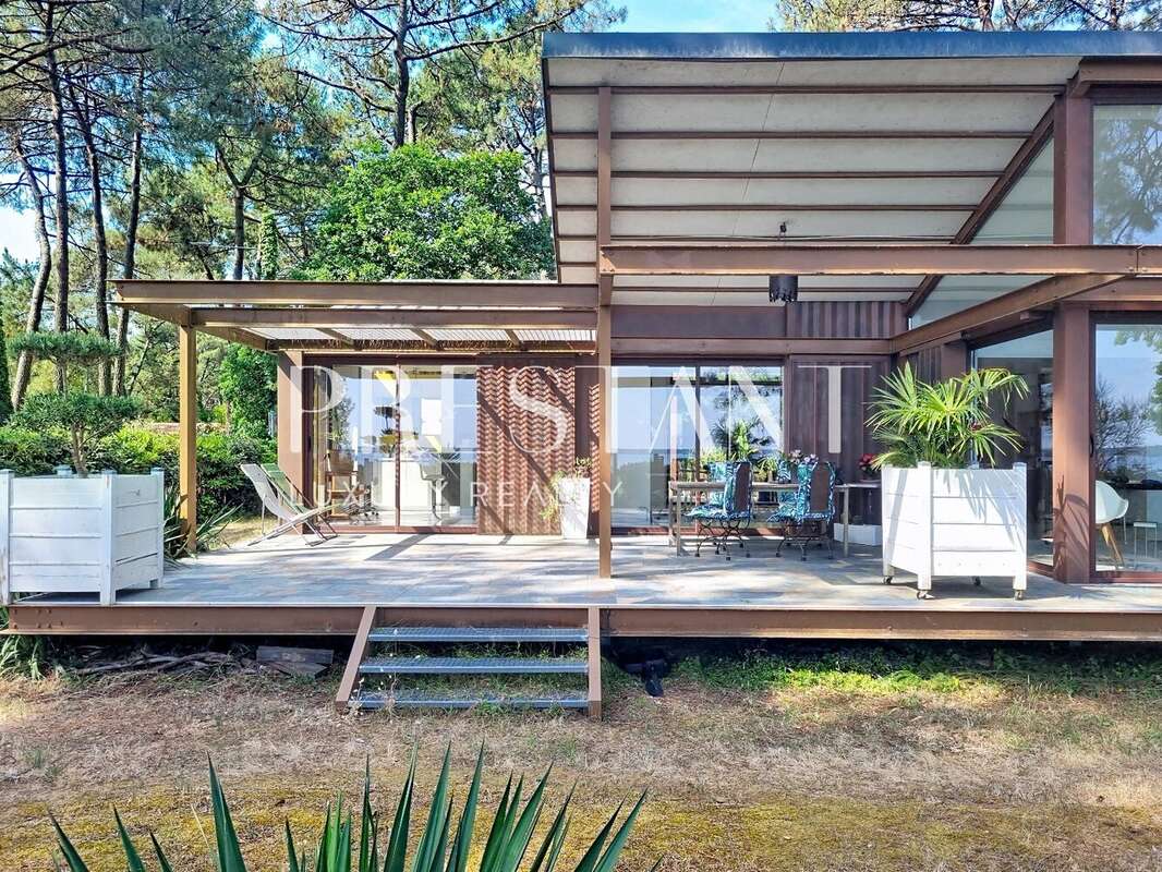 Villa d'architecte unique en première ligne face au lac de Lacanau - photo 8