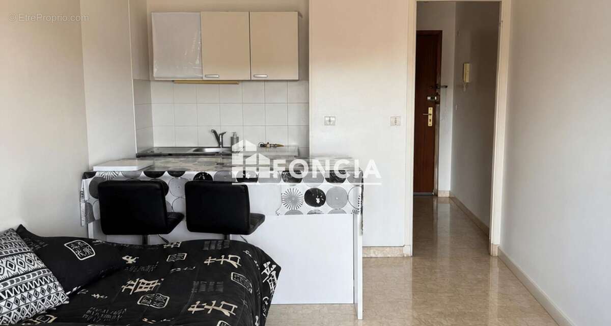 Centre ville St Laurent - Studio 24.48m2 - parking - loué - photo 4