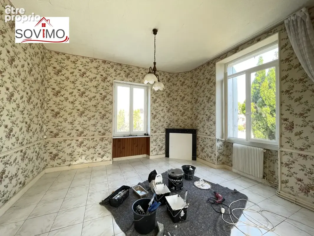 Maison de ville à rénover : jardin, garage et beau potentiel - photo 7