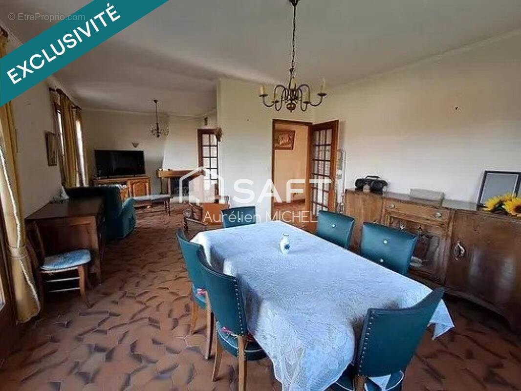 Photo 1 - Maison à VILLIEU-LOYES-MOLLON