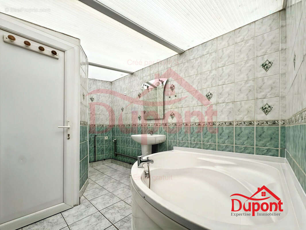 Maison 64 m² à Caudry  - photo 3