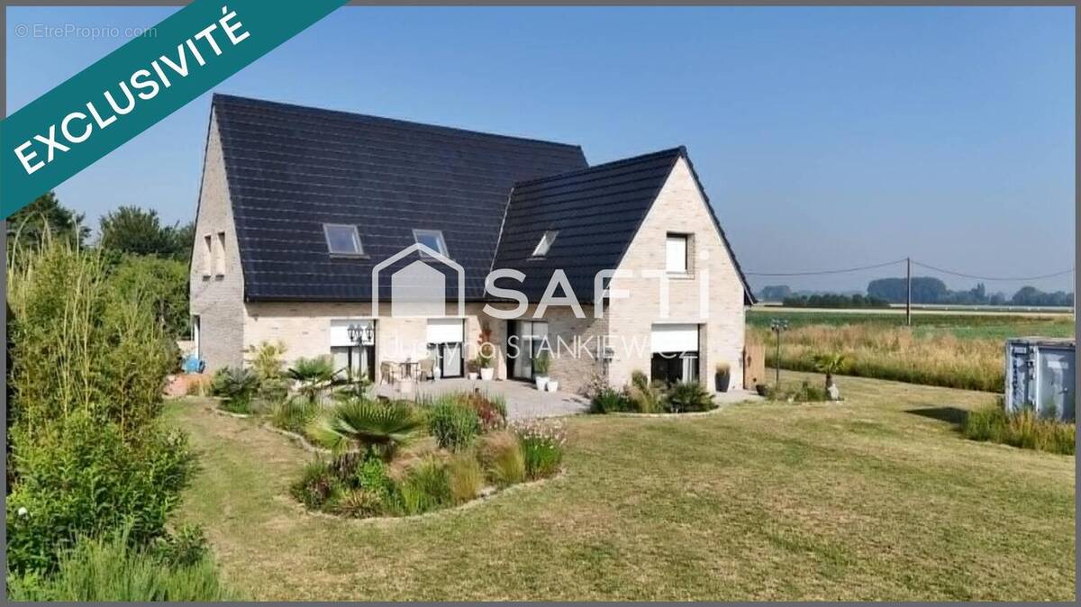 Photo 1 - Maison à BUYSSCHEURE