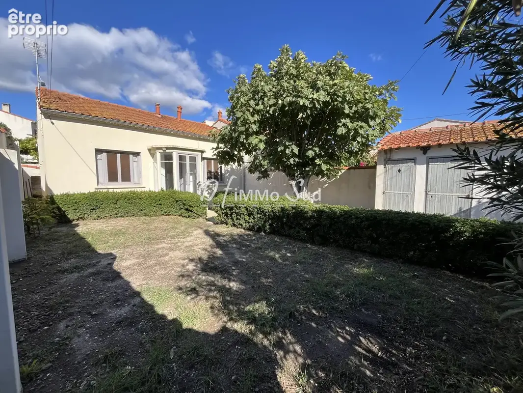 Maison de ville 3 faces avec jardin- 2 chambres- emplacement rare quartier lacroix/cassayet - photo 3