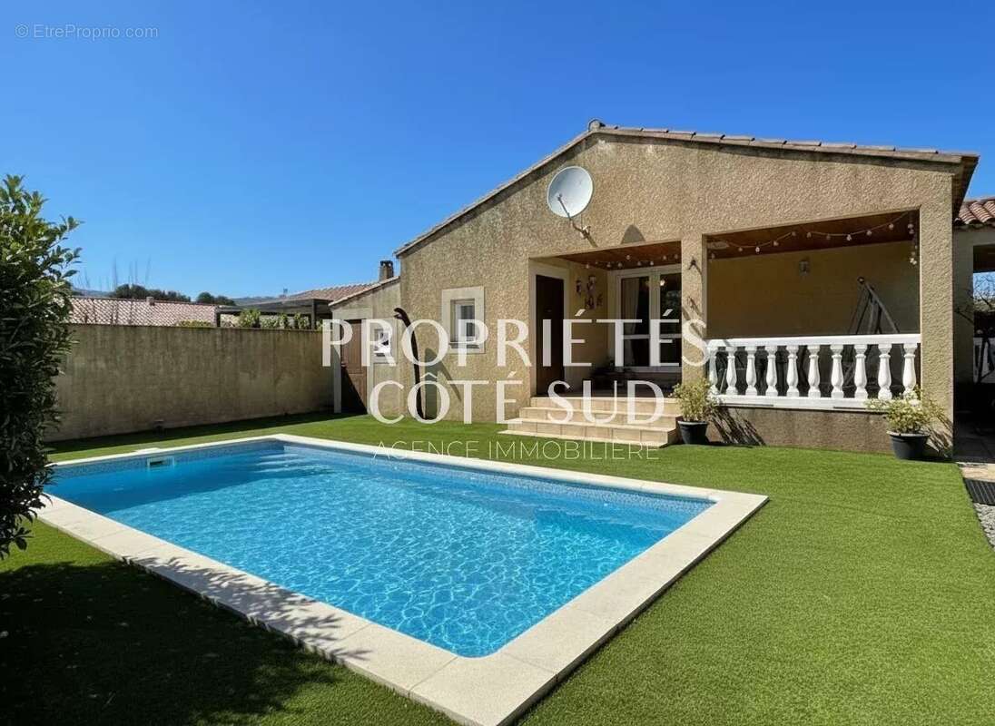 Maison à LAUDUN-L'ARDOISE