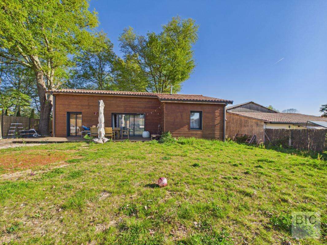 A vendre maison état neuf en bois avec jardin plein sud - photo 25