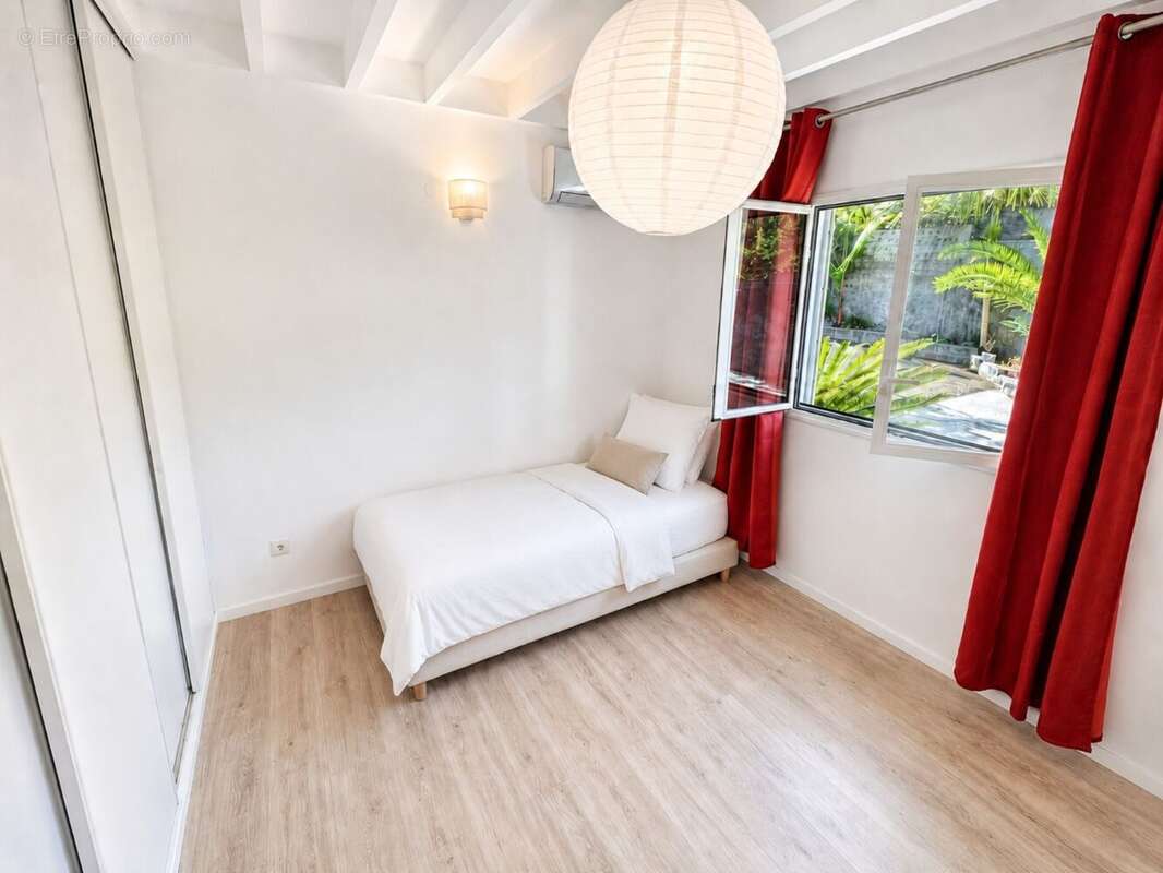 Maison 110 m² à Saint-Andre  - photo 7