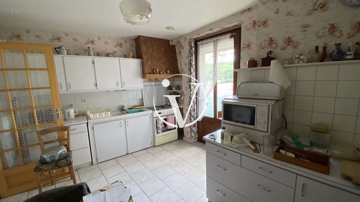 Maison à AZE