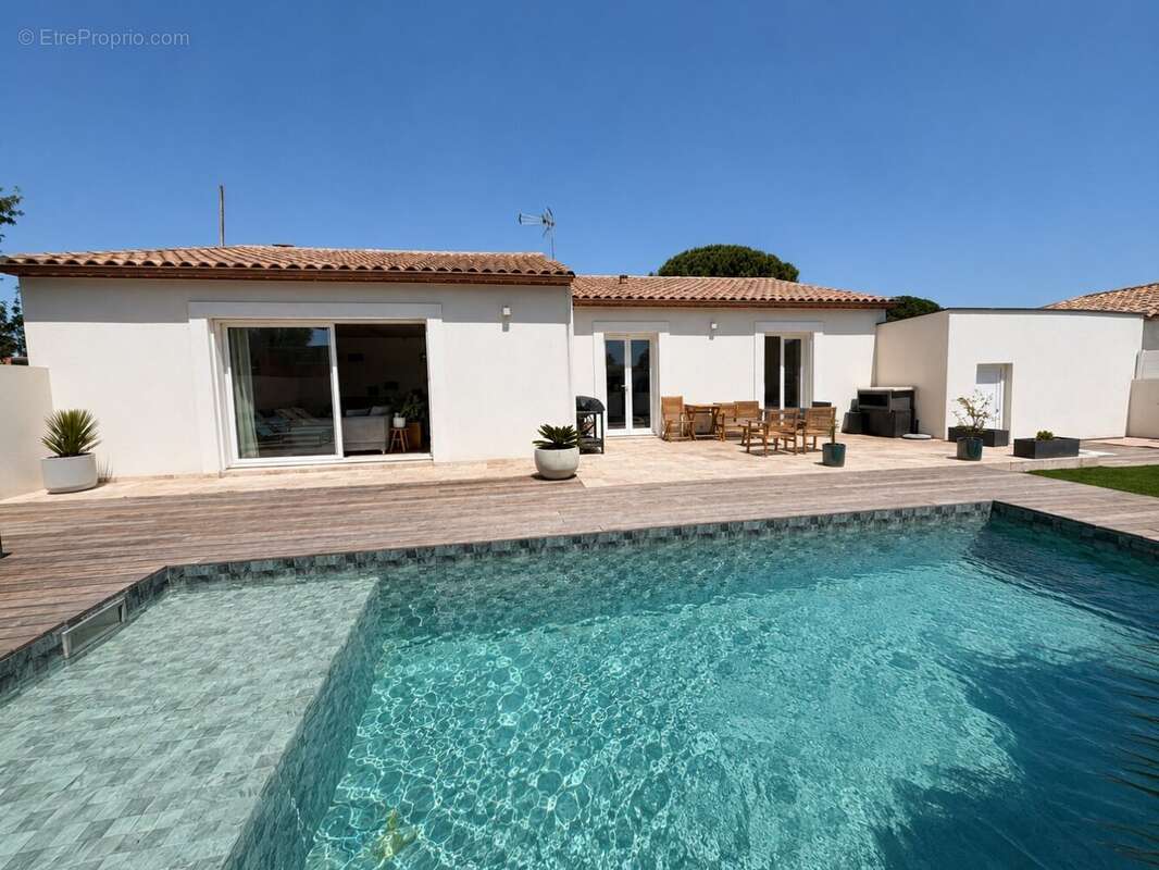 Le grau d'agde- maison t4 de 128m² - garage - terrasse - piscine - terrain de 580m². - photo 4
