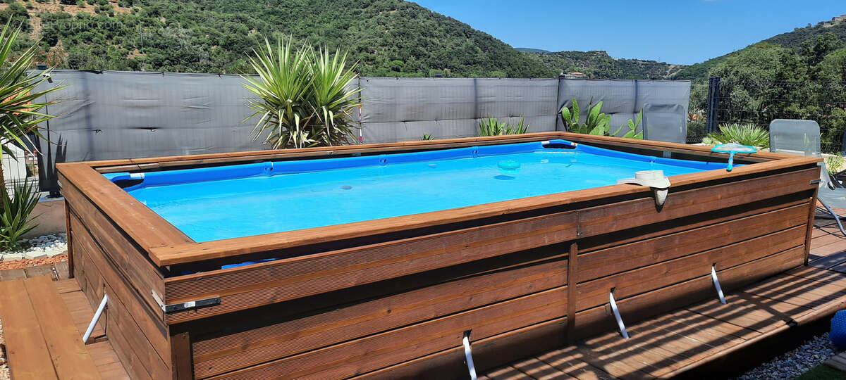 Plain-pied. re2020.terrasse.piscine. 66. vue canigou .terrasse - photo 15