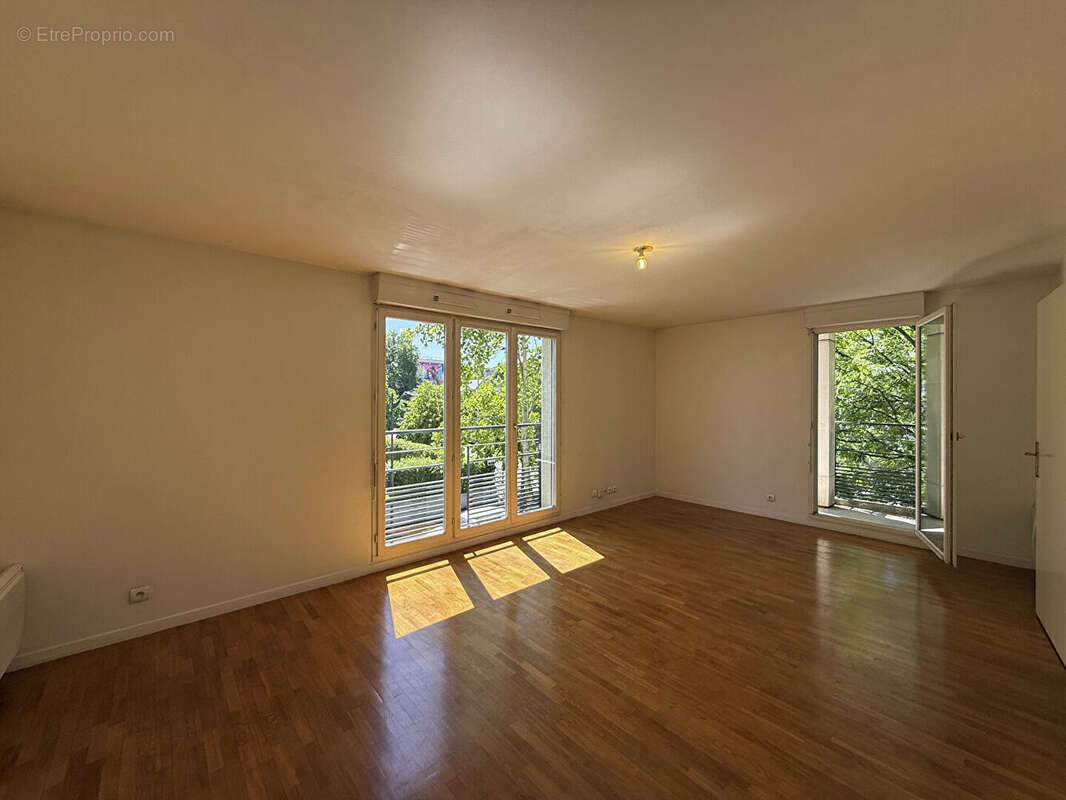 Appartement 3 pieces 61.89 m² + balcon + parking s/sol - photo 2